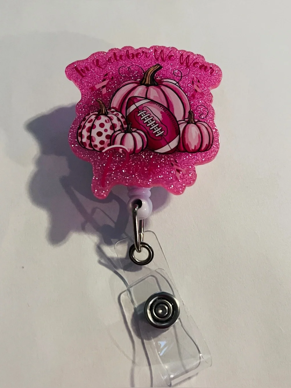 Pink Glitter Pumpkin & Football Badge Reel